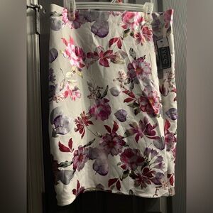 NYCC floral stretch skirt in pink’s purple silver red on a white background LG